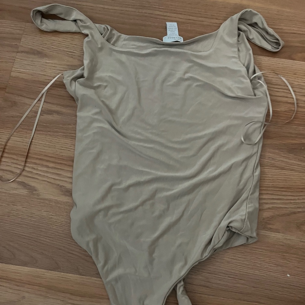 Tan tilly’s body suit size medium
